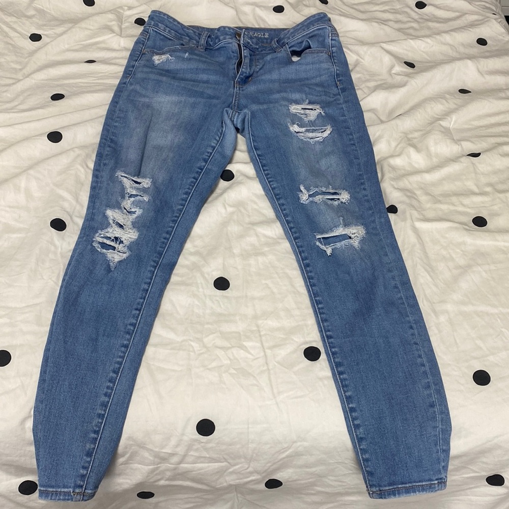 American Eagle closed ripped jeans, size US 8, very stretchy, mid rise jeans.